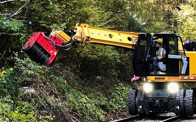 Gradall Track Star With Fecon Bull Hog Mulcher Tames Railway Vegetation